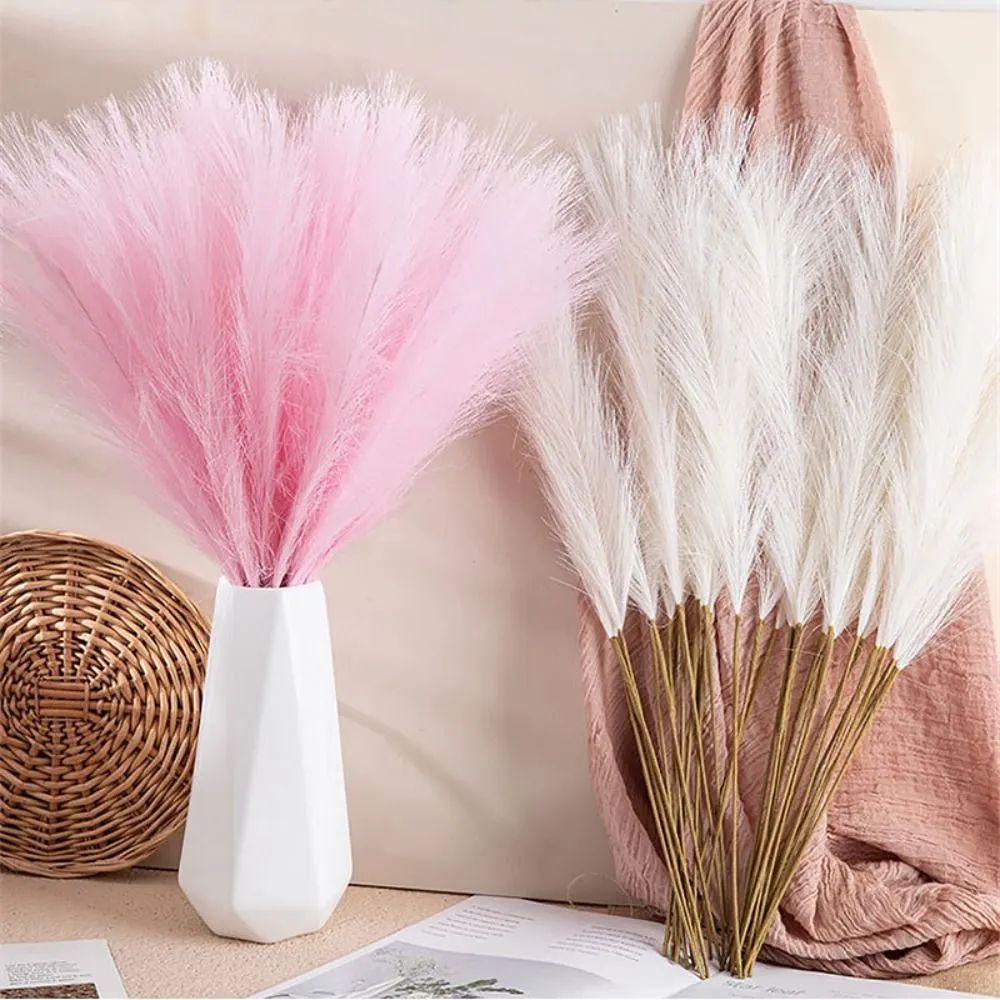 https://www.daraz.pk/products/10pcsset-simple-home-decor-fluffy-pampas-grass-55cm-flower-arrangement-fake-plant-reed-diy-boho-decor-flower-wedding-party-i645905114-s3013799525.html?